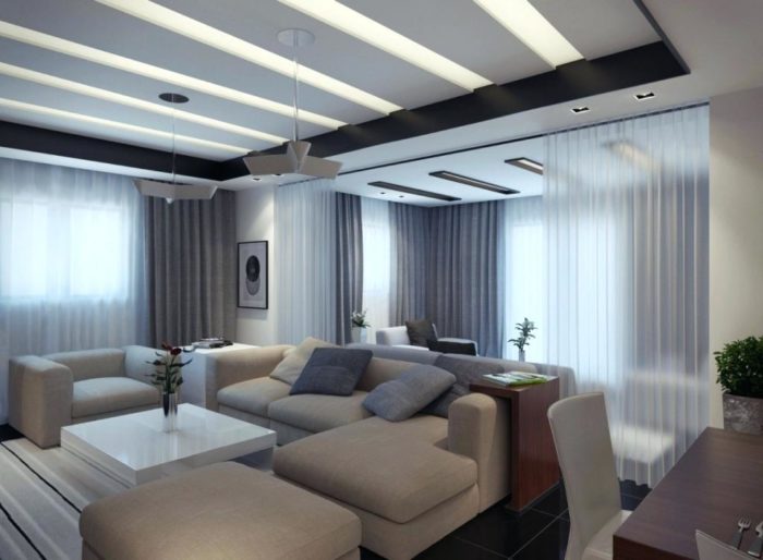 غرفة معيشة بتصميم هادئ وجميل مكونة ركنة وكرسي وباف باللون البيج وطاولة بيضاء رائعة