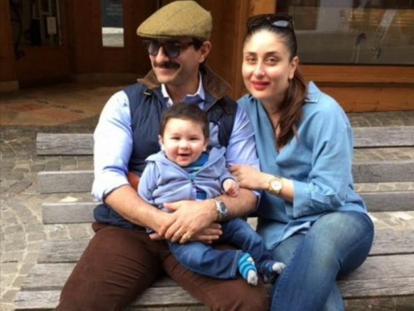 صورة للنجم سيف علي خان وزوجته كارينا كابور وابنهم تيمور